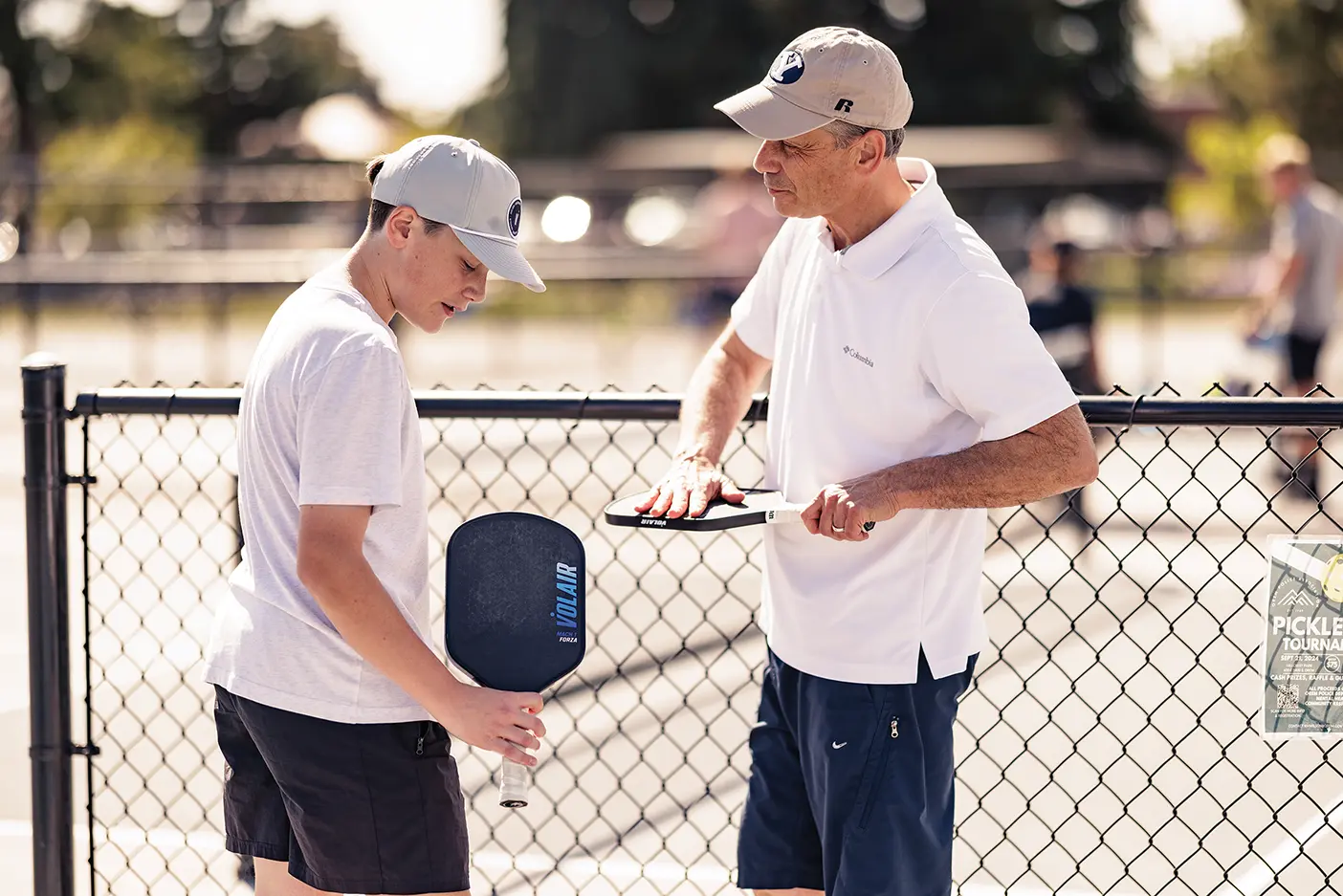 Paul Caldarella and his son playing pickleball