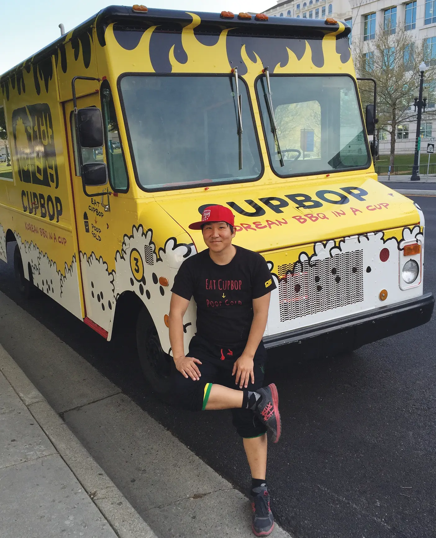 Jung Song in front of the Cupbop truck.