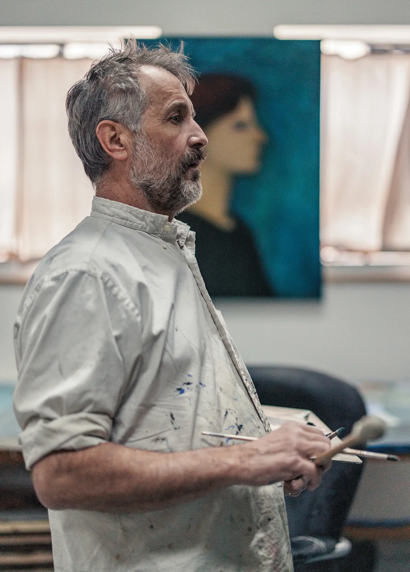 Portrait of artist Brian Kershisnik in his studio in Provo, Utah.