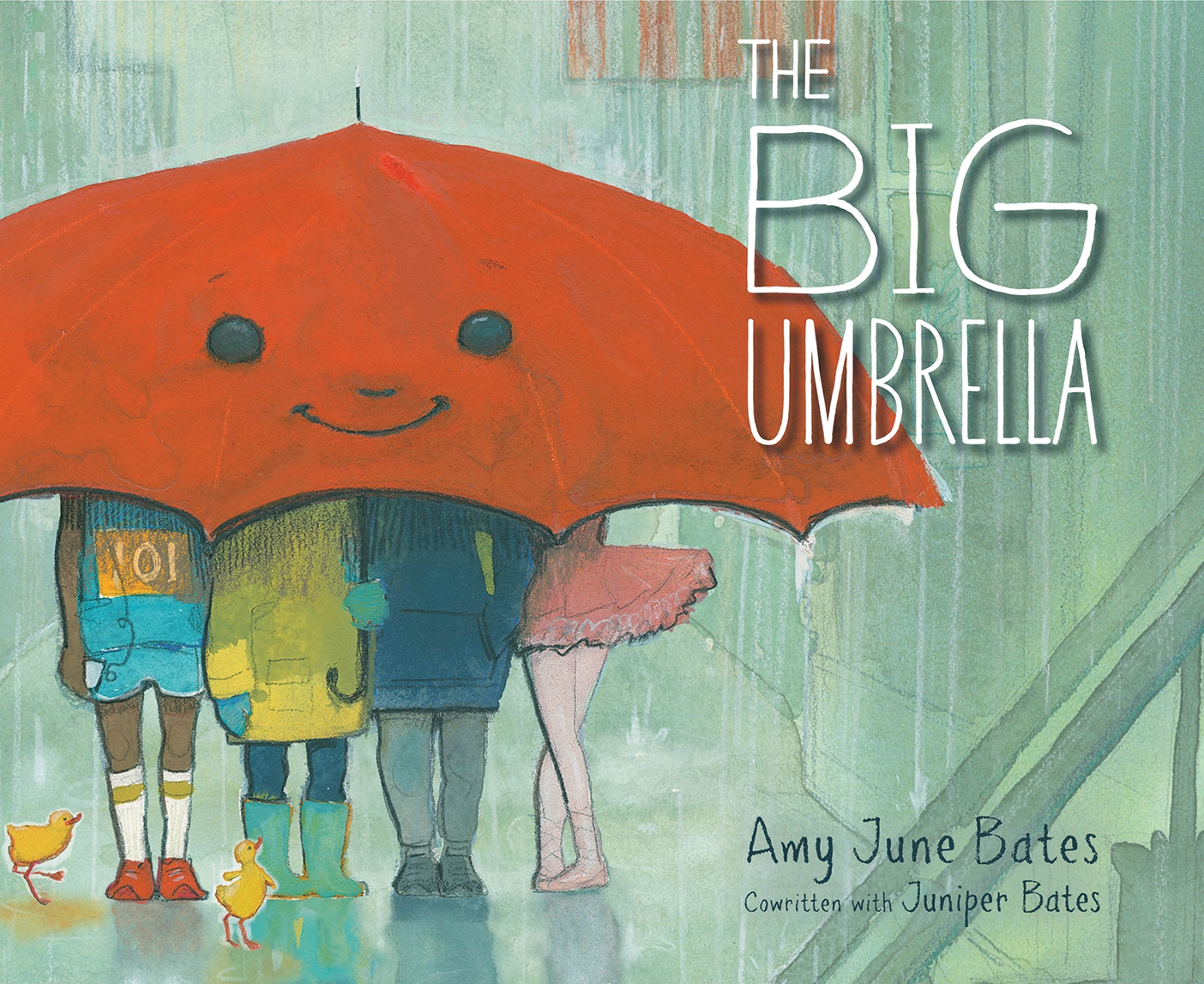 The book cover of The Big Umbrella, depicting 4 children standing under a red umbrella.