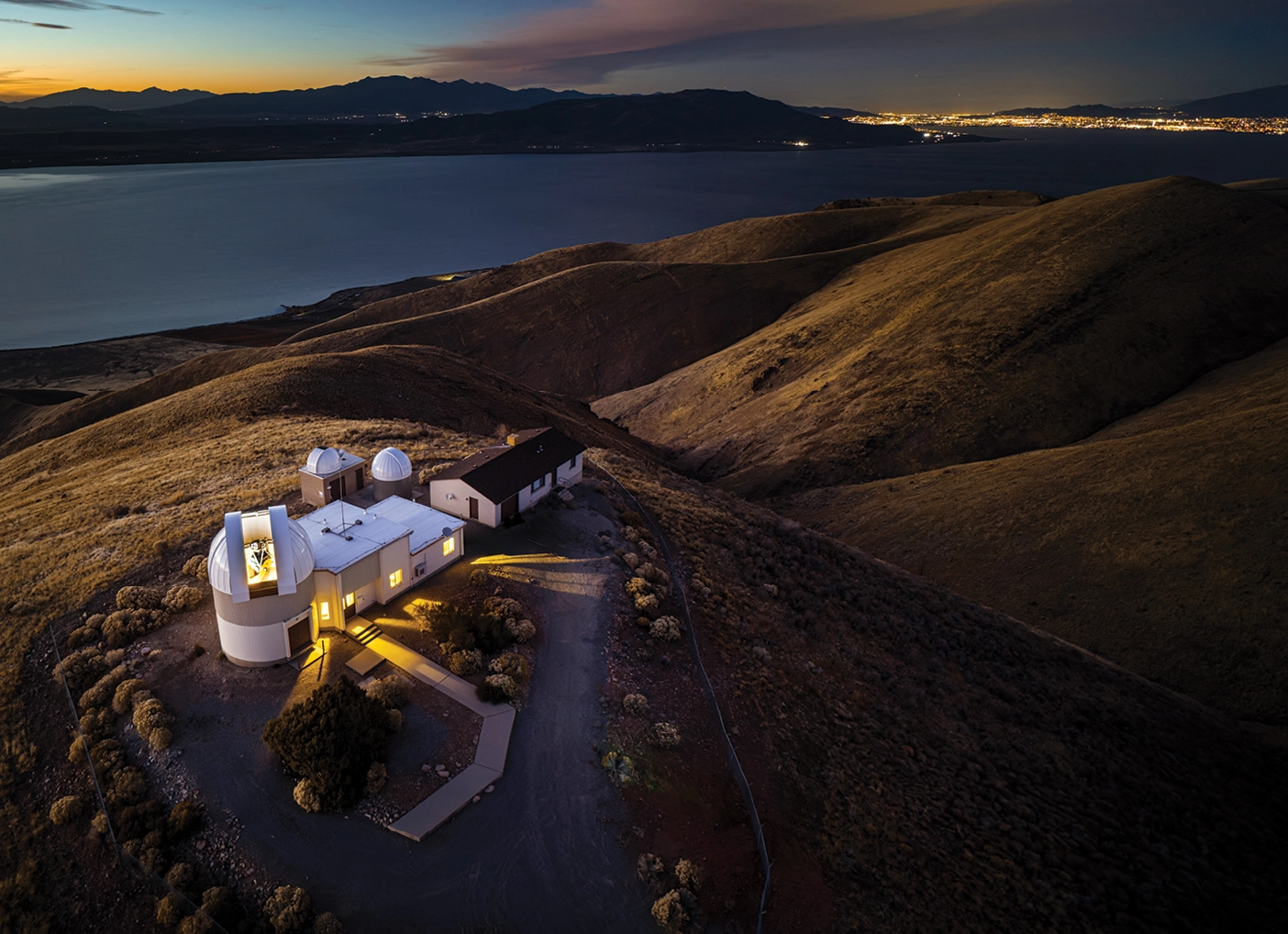 BYU's Mountain West Observatory on the ridge south of Utah Lake at dusk.