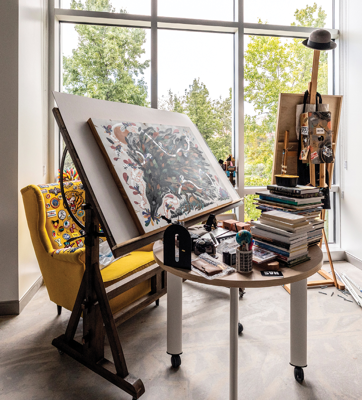 Expansive windows throughout the BYU Arts Building illuminate the work of students and faculty alike, as in the office of illustration professor David M. Habben (BFA ’06).